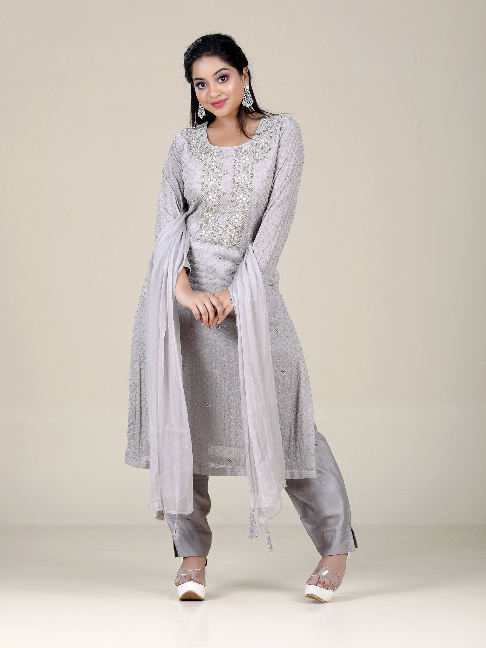 half saree studio brings you beautiful unstitched dress material with grey colour and its matching thread work which enhance the beauty of dress.