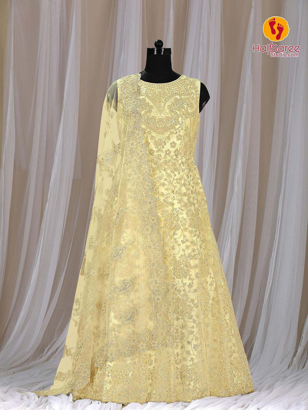 Dummy has dressed up with stunning looking yellow colour beaded work net gown