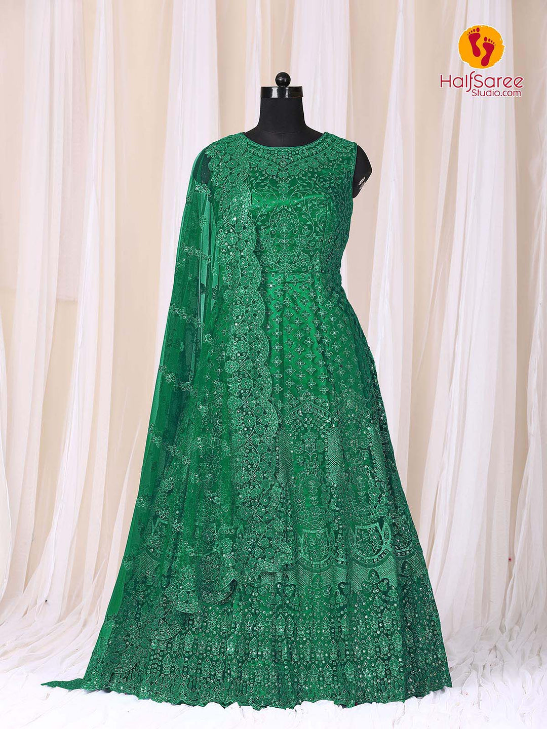 Black dummy has dressed up with Green colour party wera embroidered net gown